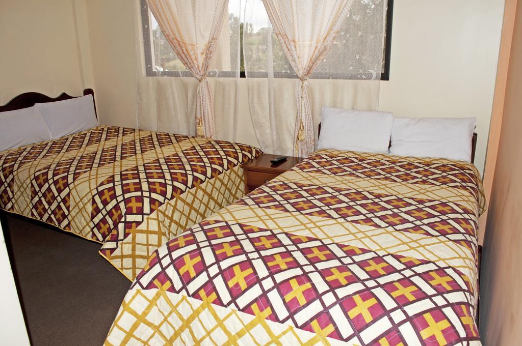 Hotel Residencial El Viajero Табабела Стая снимка